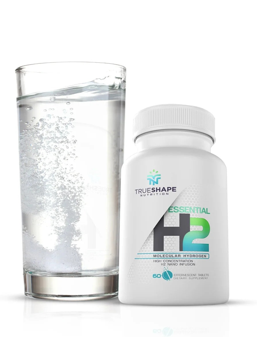 Essential H2 hydrogen water tablets with magnesium, bottle and glass of water